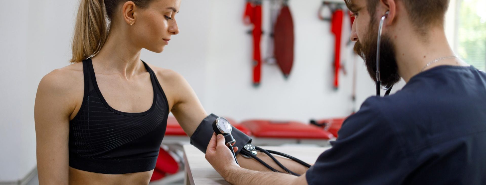 Athlete having their blood pressure monitored.