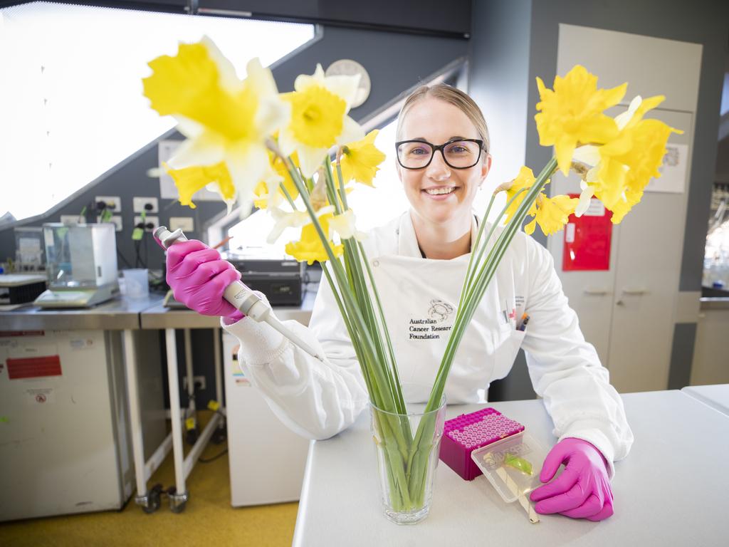 Dr Kelsie Raspin with daffodils